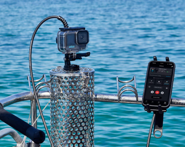 GoPro mounted on burley pot using Seavu Seeker Kit, connected to phone for live underwater fishing view